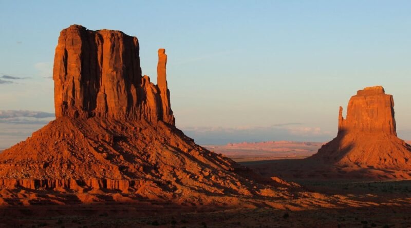 Beautiful view of Monument Valley's iconic rock formations during sunset.